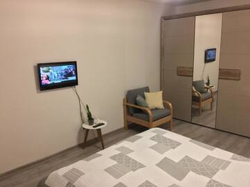 Фото номера Семейный люкс с балконом Проживание в семье Smiltės apartamentai г. Бирштонас 10